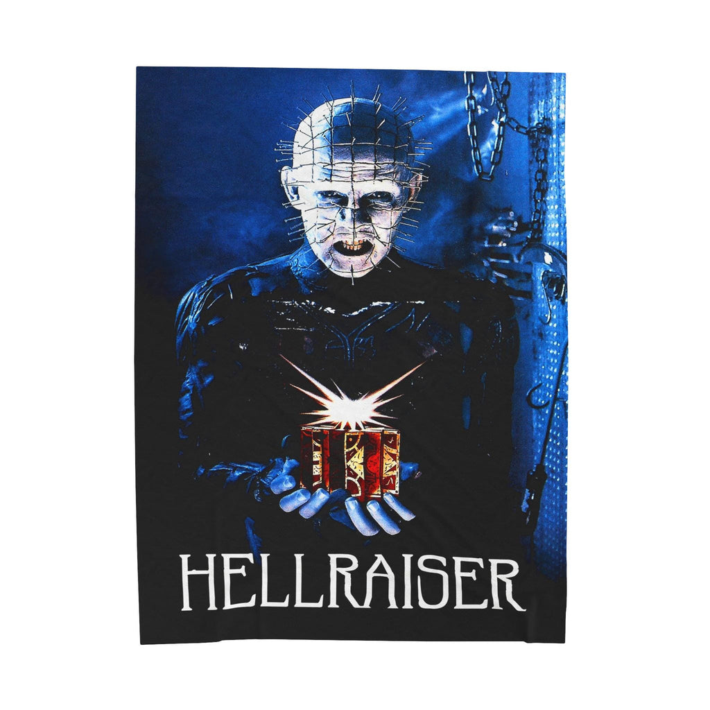 A high-quality micro fleece blanket featuring Pinhead from the 1987 movie Hellraiser holding the glowing Lament Configuration puzzle box against a dark blue background.