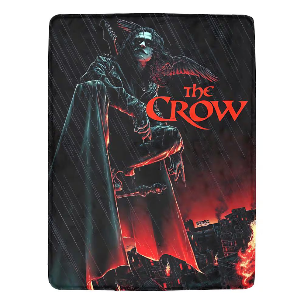 Blanket with 'The Crow' design featuring a character in a red robe and a crow, with a dark, rain-slicked cityscape in the background.