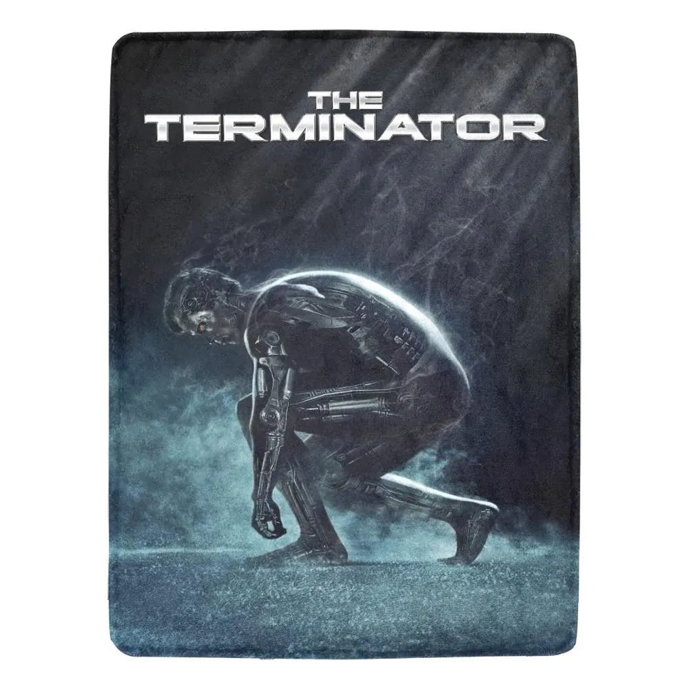 Blanket with 'The Terminator' robot design on a dark background