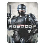 RoboCop character holding a gun with 'Robocop' text on a gray background